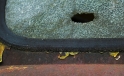 Loch in Windschutzscheibe eines Saurer Lastwagens / Hole in the Front Shield of a Saurer Truck Loch in Windschutzscheibe eines Saurer Lastwagens / Hole in the Front Shield of a Saurer Truck